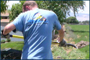 Figure 2 Twisting the back while digging.