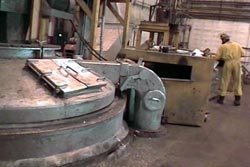 Fig. 1. Manual removal of dross may expose workers to lead dust and fume