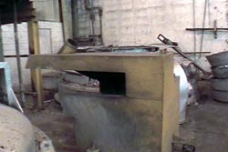 Fig. 2. Portable dross hood with flexible duct attachment port