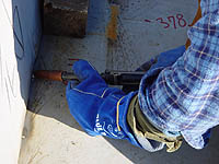 Figure 1: Worker wearing hand protection