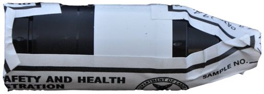 Figure E-5. Standard asbestos cassette (25mm) correctly sealed with a Form OSHA-21.