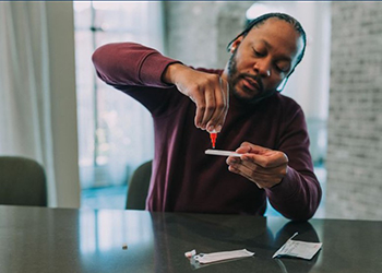Man taking COVID test