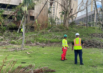 Recovery team wearing hardhats and hi-viz vests