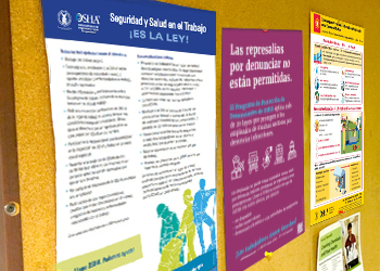 Safety posters displayed on wall