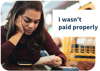 I wasn't paid properly - woman reviewing paycheck